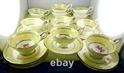 11 Antique Coalport Floral HP Yellow Gold Trim Footed Cup & Saucer Sets