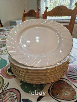 51 Piece Dinning Set. Harmony Bone China set with Gold rim around each iteam