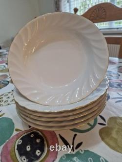51 Piece Dinning Set. Harmony Bone China set with Gold rim around each iteam