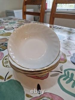 51 Piece Dinning Set. Harmony Bone China set with Gold rim around each iteam