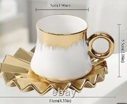 6 piece ottomon -Style coffee set with gold rims