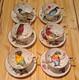 6x Matching Cup And Saucers Each Decorated With Colourful Birds With Gilt Rims