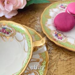 Antique Cauldon teacup trio, handpainted flowers, ornate gilding, green & gold B