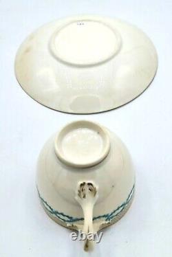 Antique Minton split handle cup and saucer with turquoise and gold bands c1850