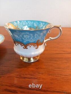 Antique Paragon tea cup and saucer Turquoise and gold Rose, Flowers