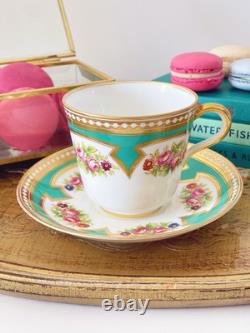 Brown Westhead Moore teacup and saucer, gilded, handpainted flowers, turquoise