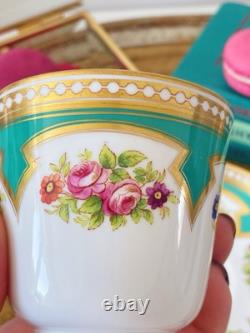 Brown Westhead Moore teacup and saucer, gilded, handpainted flowers, turquoise