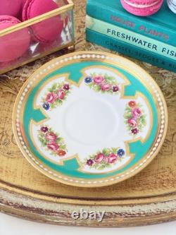 Brown Westhead Moore teacup and saucer, gilded, handpainted flowers, turquoise
