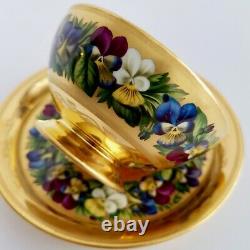 Extremely rare Vienna teacup and saucer, gilt and pansies by Anton Friedl, 1826