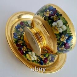 Extremely rare Vienna teacup and saucer, gilt and pansies by Anton Friedl, 1826