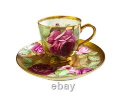 Ginori cup and saucer hand painted with roses and gilded, signed by artist