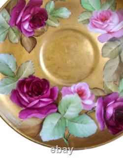 Ginori cup and saucer hand painted with roses and gilded, signed by artist