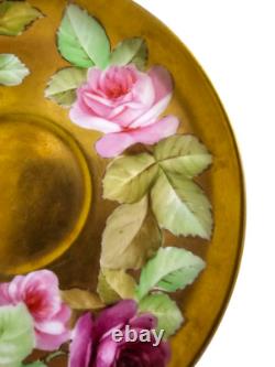 Ginori cup and saucer hand painted with roses and gilded, signed by artist