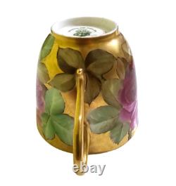 Ginori cup and saucer hand painted with roses and gilded, signed by artist