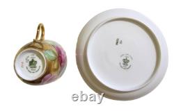 Ginori cup and saucer hand painted with roses and gilded, signed by artist