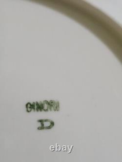 Ginori cup and saucer hand painted with roses and gilded, signed by artist