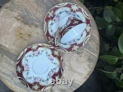 Hand-painted Nippon porcelain teacup and saucer with floral and gold decoration
