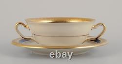 Hutschenreuther, Germany. Seven bouillon cups and saucers in porcelain