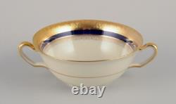 Hutschenreuther, Germany. Seven bouillon cups and saucers in porcelain