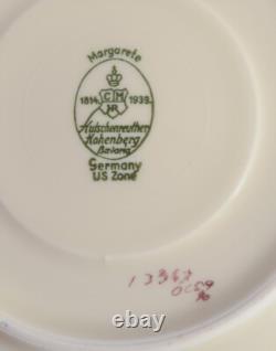 Hutschenreuther, Germany. Seven bouillon cups and saucers in porcelain