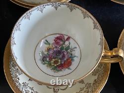 Hutschenreuther Selb Bavaria Porcelain Gold Encrusted Tea Cups and Saucers