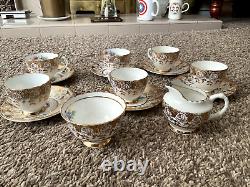 Imperial fine english bone china Shelley daisy Gold Trim and Floral Cups, Sauser