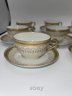 Limoges B & Co France L Bernardaud cup and saucers gold service for 8