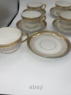 Limoges B & Co France L Bernardaud cup and saucers gold service for 8