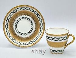 Minton cup and saucer G9982 with acid etched gold band border & laurel wreath