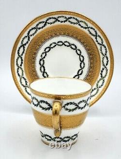 Minton cup and saucer G9982 with acid etched gold band border & laurel wreath