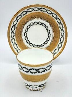 Minton cup and saucer G9982 with acid etched gold band border & laurel wreath