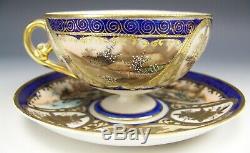 Nippon Hand Painted Scenes Raised Gold Footed Tea Cup & Saucer