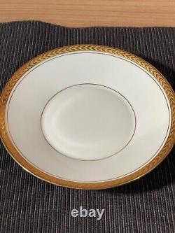 Pair of Limoges ULIM Cups and Saucers, with gold trim
