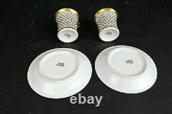 Pair vintage French Limoges heavy gilded cup and saucers