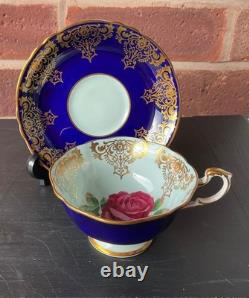 Paragon Cobalt Blue Rose Gold Rim Bone China Footed Cup and Saucer. Beautiful