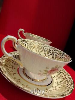 Paragon Set Of Two Cups and Saucers Flower, Gold Gilt, To Her Majesty the Queen