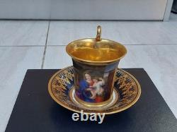 Paris (Darte Freres) porcelain Gold Ground Cup and Saucer with finely painted p