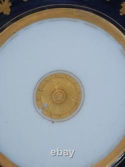 Paris (Darte Freres) porcelain Gold Ground Cup and Saucer with finely painted p