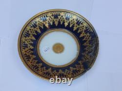 Paris (Darte Freres) porcelain Gold Ground Cup and Saucer with finely painted p