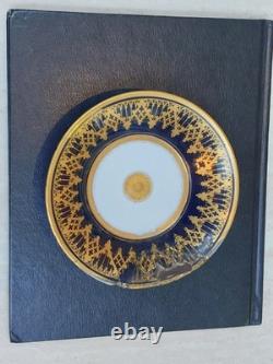 Paris (Darte Freres) porcelain Gold Ground Cup and Saucer with finely painted p