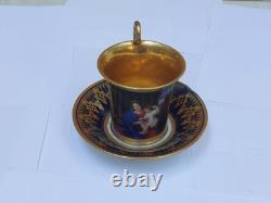 Paris (Darte Freres) porcelain Gold Ground Cup and Saucer with finely painted p