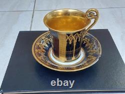 Paris (Darte Freres) porcelain Gold Ground Cup and Saucer with finely painted p