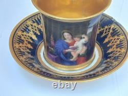 Paris (Darte Freres) porcelain Gold Ground Cup and Saucer with finely painted p