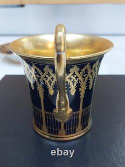Paris (Darte Freres) porcelain Gold Ground Cup and Saucer with finely painted p