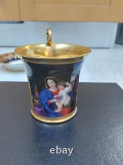 Paris (Darte Freres) porcelain Gold Ground Cup and Saucer with finely painted p