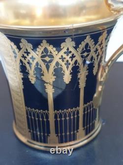 Paris (Darte Freres) porcelain Gold Ground Cup and Saucer with finely painted p