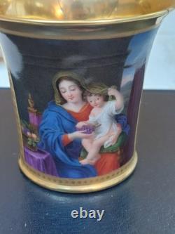 Paris (Darte Freres) porcelain Gold Ground Cup and Saucer with finely painted p