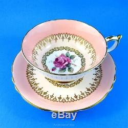 Pink Rose Center with a Two Tone Peach and Gold Border Paragon Tea Cup & Saucer