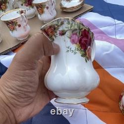 Porcelain Floral Tea Set White with Gold Trim Teapot Cups Saucers Creamer