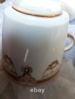 Rare Vintage Porcelain cups x12 and saucers X 5 white with gold and pink flower